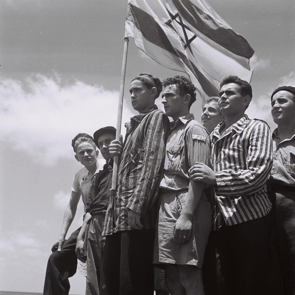 Buchenwald survivors arrive in Haifa to be arrested by the British, 1945 (Wikimedia Commons)