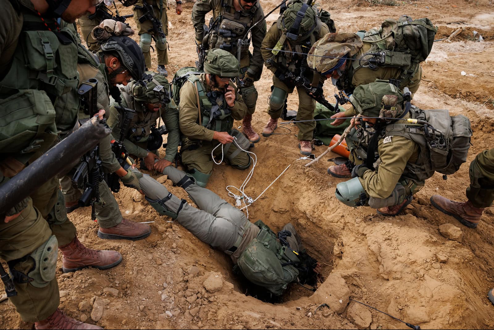 A Jerusalem Brigade soldier is lowered into a terror tunnel shaft discovered in Gaza, November 2023. Photo by Ziv Koren/Polaris Images