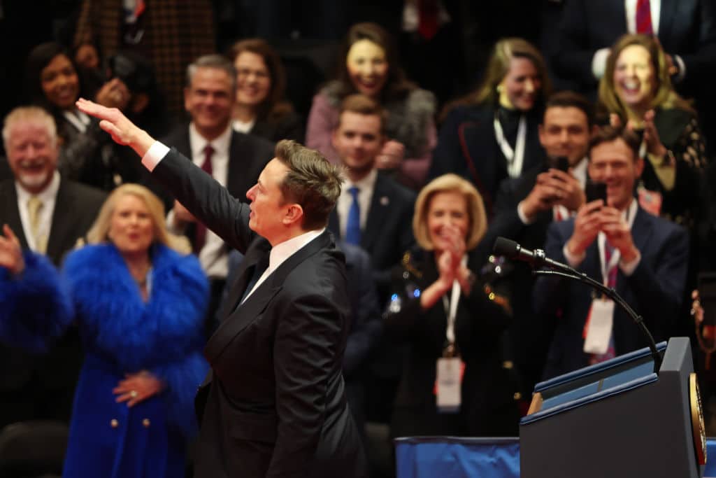 WASHINGTON, DC - JANUARY 20: Tesla, SpaceX and X CEO Elon Musk gestures while speaking during an inauguration event at Capital One Arena on January 20, 2025 in Washington, DC. Donald Trump takes office for his second term as the 47th president of the United States. (Photo by Justin Sullivan/Getty Images)