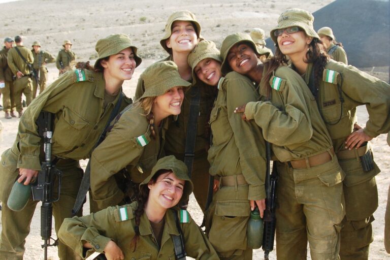 Female infantry instructors take a break from their intensive course in southern Israel on August 3, 2011. (Photo courtesy: Israel Defense Forces)