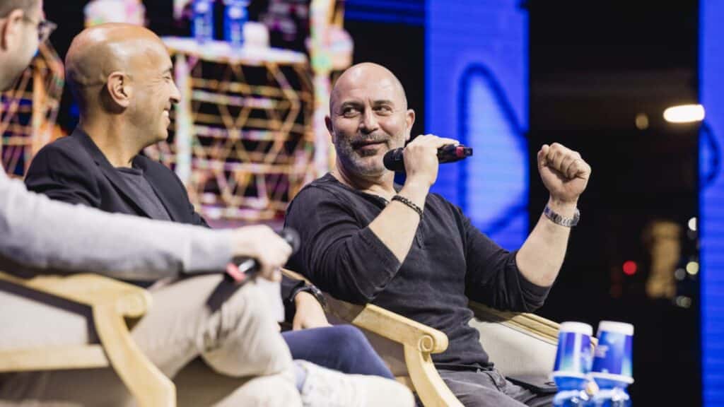 Lior Raz, right, and Avi Issacharoff speaking about their hit show, “Fauda,” at the OurCrowd Global Investor Summit in Jerusalem, February 15, 2023. Photo by Tomer Foltyn