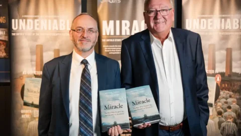 Rabbi Naftali Schiff, left, and Michael Calvin, co-authors of the book "Miracle." (Jacob Gersch photography)