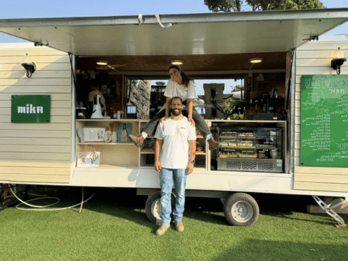 Shon and her partner, Lior, in front of Mika Coffee (Mika Coffee)