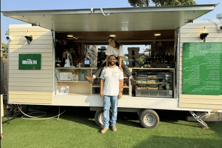 Shon and her partner, Lior, in front of Mika Coffee (Mika Coffee)