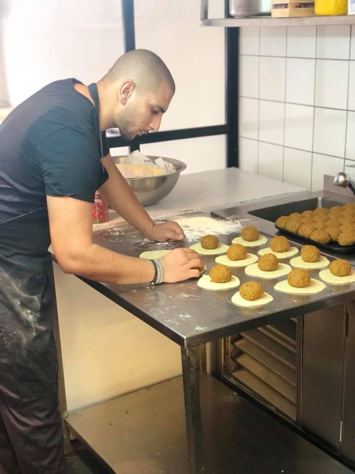 In the kitchen at Azura, a Turkish-Iraqi restaurant in Machane Yehuda. Photo via Facebook