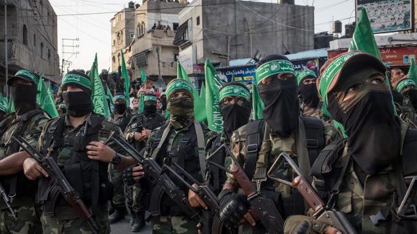 Hamas members are seen during a military show in the Bani Suheila district on July 20, 2017 in Gaza City. (Photo by Chris McGrath/Getty Images)