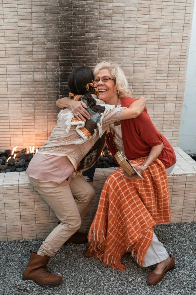 Woman hugging her grandmother. 